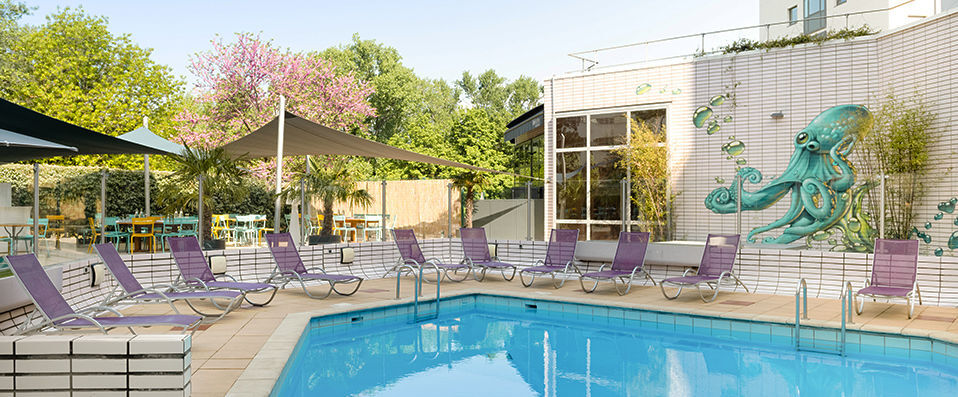 Novotel Lyon Gerland Musée des Confluences ★★★★ - Pastel coloured buildings nestled amongst exotic surroundings. - Lyon, France