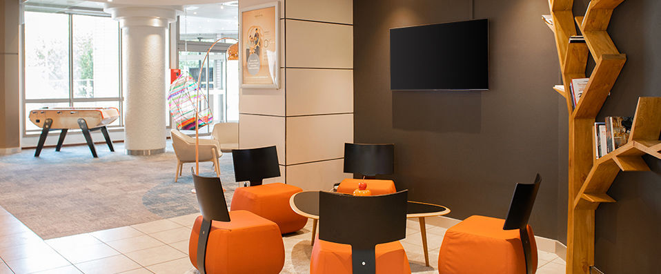 Novotel Lyon Gerland Musée des Confluences ★★★★ - Pastel coloured buildings nestled amongst exotic surroundings. - Lyon, France