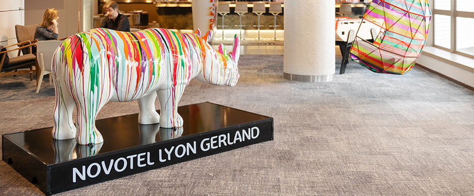 Novotel Lyon Gerland Musée des Confluences ★★★★ - Pastel coloured buildings nestled amongst exotic surroundings. - Lyon, France