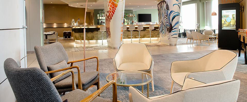 Novotel Lyon Gerland Musée des Confluences ★★★★ - Pastel coloured buildings nestled amongst exotic surroundings. - Lyon, France