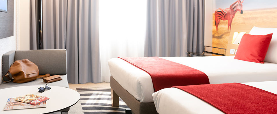 Novotel Lyon Gerland Musée des Confluences ★★★★ - Pastel coloured buildings nestled amongst exotic surroundings. - Lyon, France