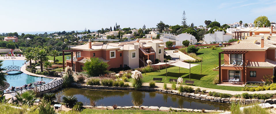 Monte Santo Resort ★★★★★ - Groves of grape trees stand tall against the beautifully wrought limestone rocks in Algarve. - Algarve, Portugal