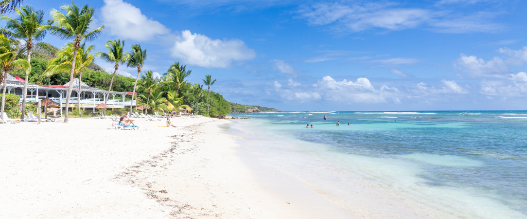 Village Pierre & Vacances - Sainte-Anne Guadeloupe - Océan et pieds dans le sable : voyage caribéen dans l’exotique guadeloupéen. - Guadeloupe, France